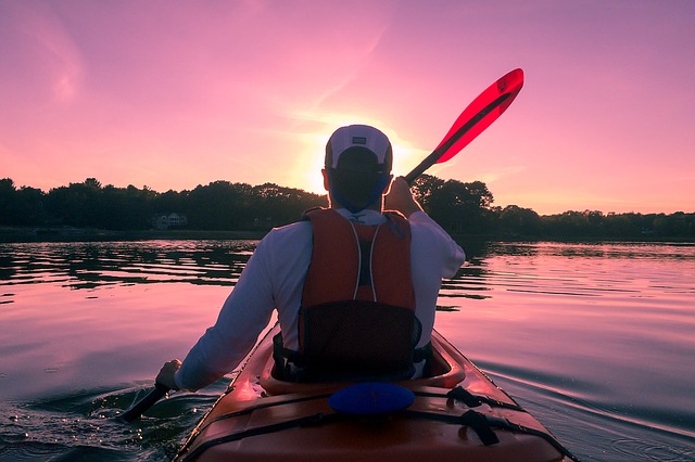 kayaker at sunset