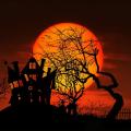 spooky moon with house and tree