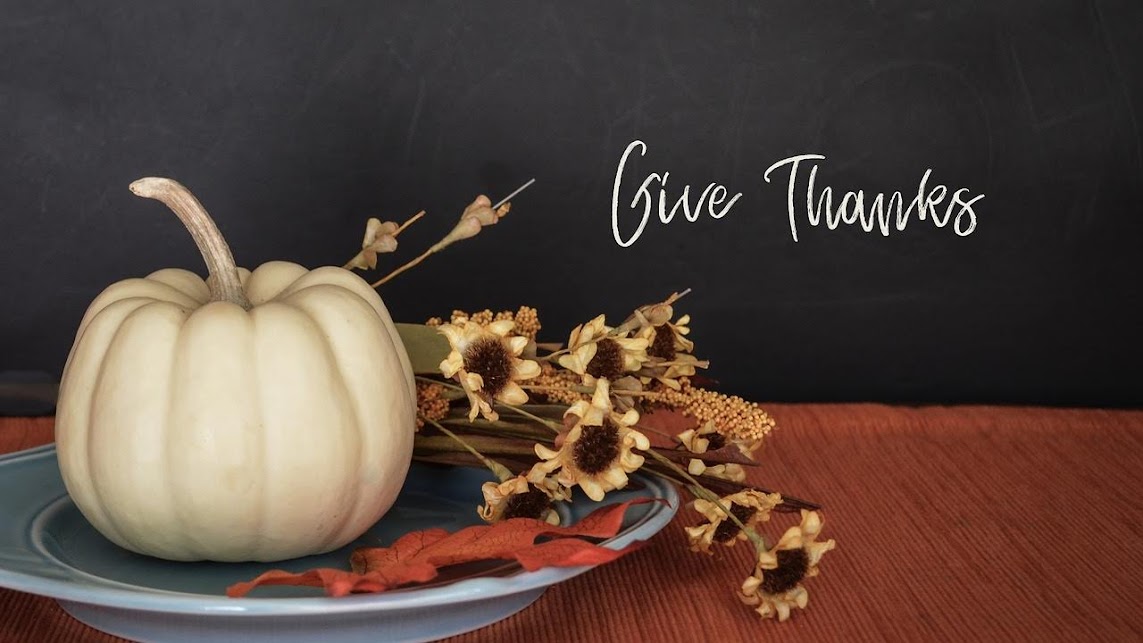 pumpkin with flowers with words give thanks